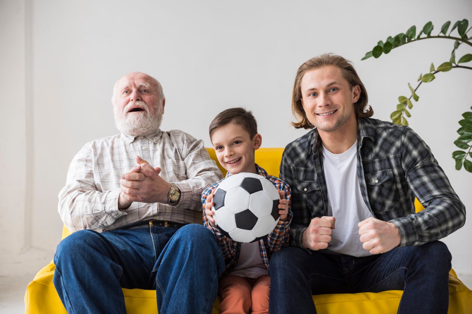 multigenerational-men-watching-soccer-home